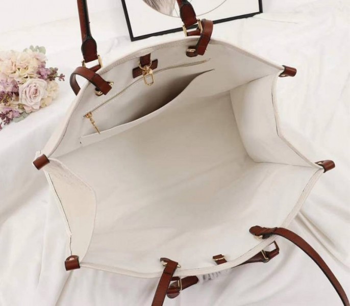 Louis Vuitton Monogram Empreinte Giant Onthego GM Tote In Cream – Brown