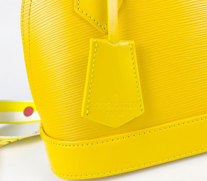 Louis Vuitton Epi Leather Alma BB Handbag In Cedrat Yellow With Jacquard Strap