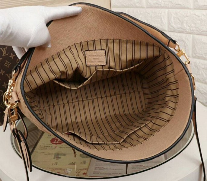 Louis Vuitton Monogram Empreinte Melie Hobo In Beige