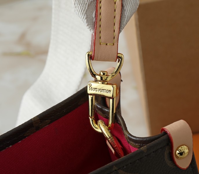 X TM Monogram Canvas Onthego PM