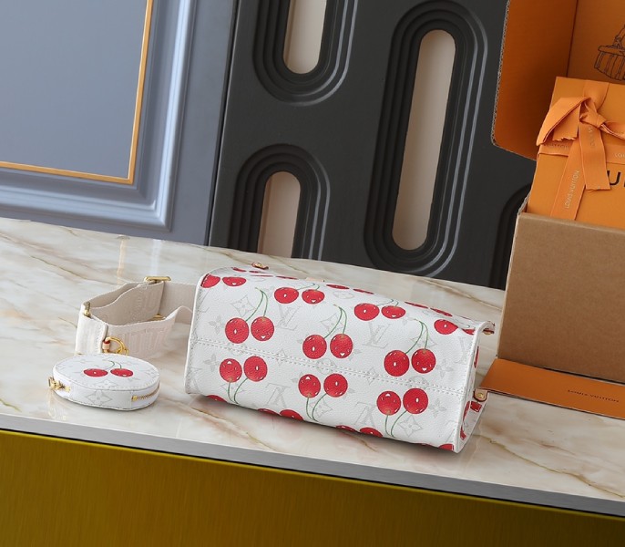 X TM Monogram Cherry Canvas Onthego PM In White