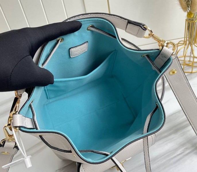 Louis Vuitton Lockme Bucket Bag In Greige