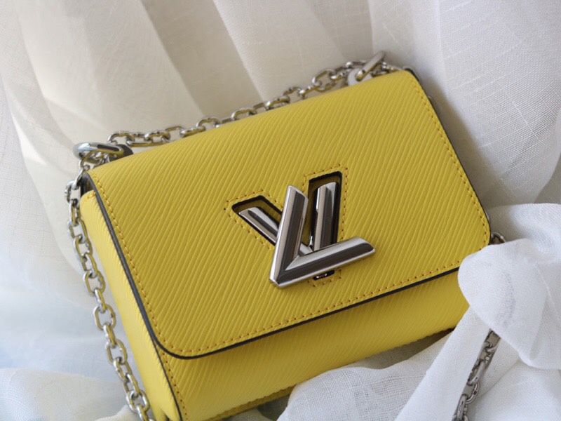 Louis Vuitton Epi Leather Twist Mini Bag In Yellow