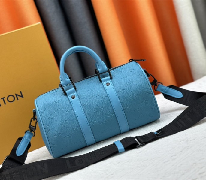 Louis Vuitton Taurillon Monogram Leather Keepall Bandouliere 25 In Turquoise