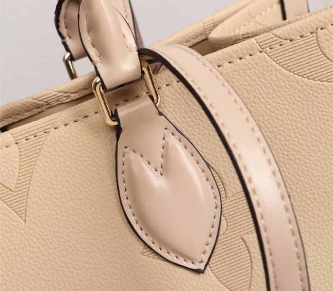 Louis Vuitton Monogram Empreinte Giant Onthego MM Bag In Beige