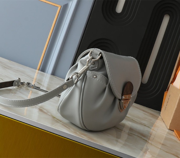 Louis Vuitton Sunset Vibe Bag In Limestone Gray