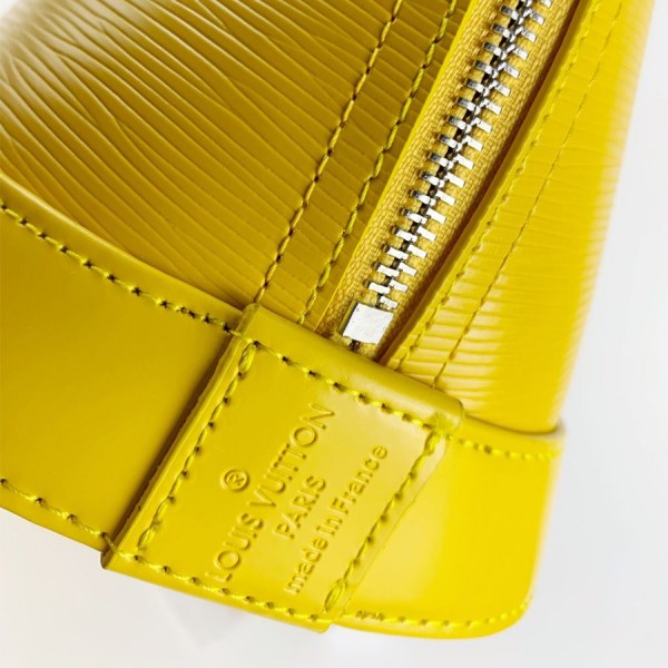 Louis Vuitton Epi Leather Alma PM Handbag In Cedrat Yellow With Jacquard Strap