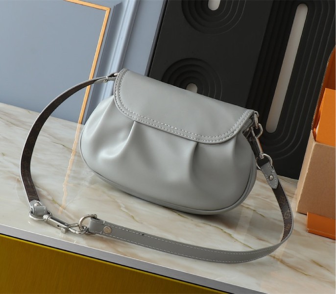 Louis Vuitton Sunset Vibe Bag In Limestone Gray