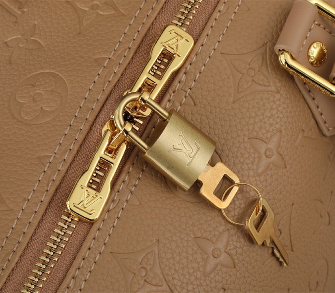 Louis Vuitton Monogram Empreinte Speedy Soft 30 Handbag In Apricot