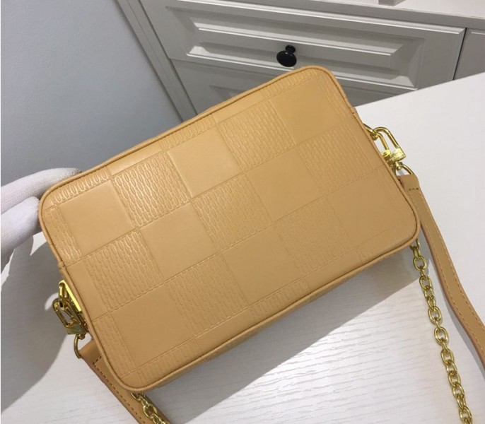 Louis Vuitton Troca PM Bag In Beige