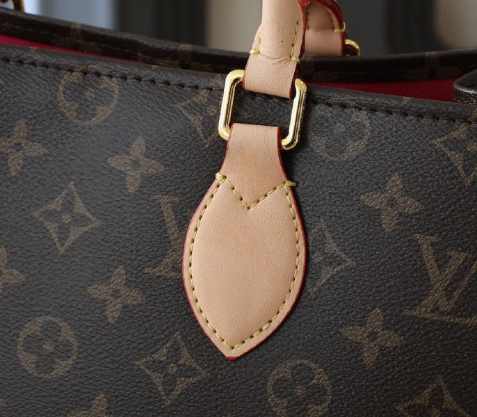 X TM Monogram Canvas Onthego MM