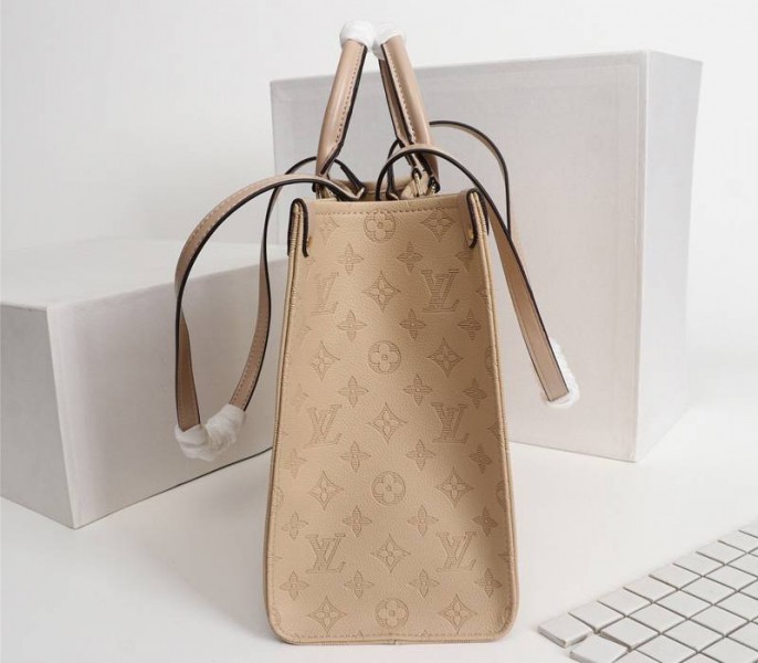 Louis Vuitton Monogram Empreinte Giant Onthego MM Bag In Beige