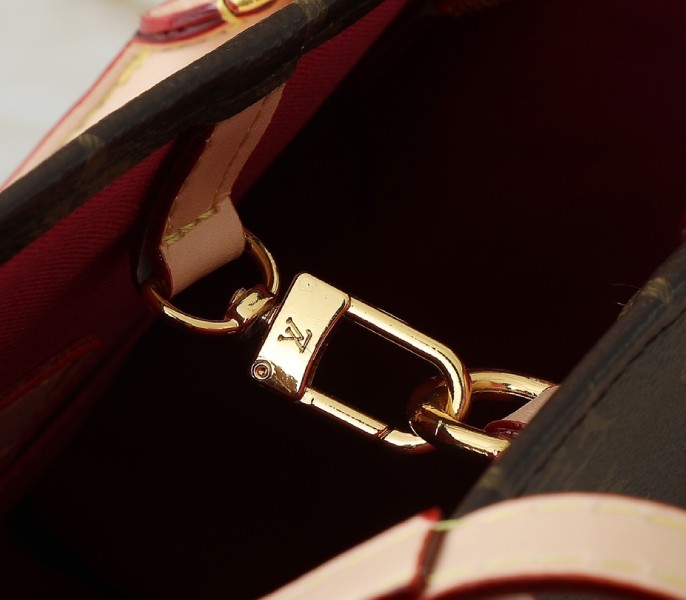 X TM Monogram Canvas Onthego MM