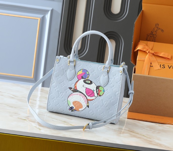 X TM Monogram Empreinte OnTheGo PM With Bijou Edition In Washed Blue