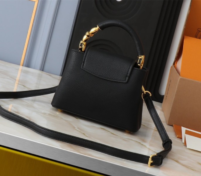 Louis Vuitton Capucines Mini Capucines Handbag In Black