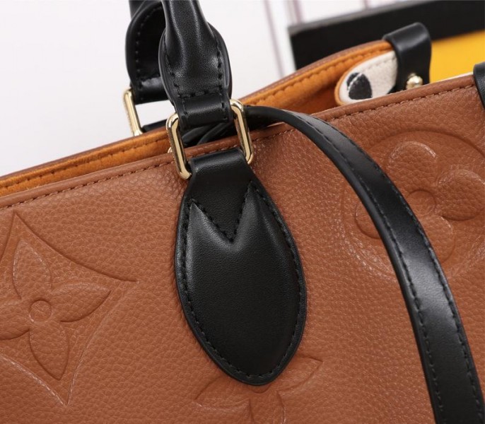 Louis Vuitton Monogram Empreinte Wild At Heart Onthego MM Tote In Caramel Brown