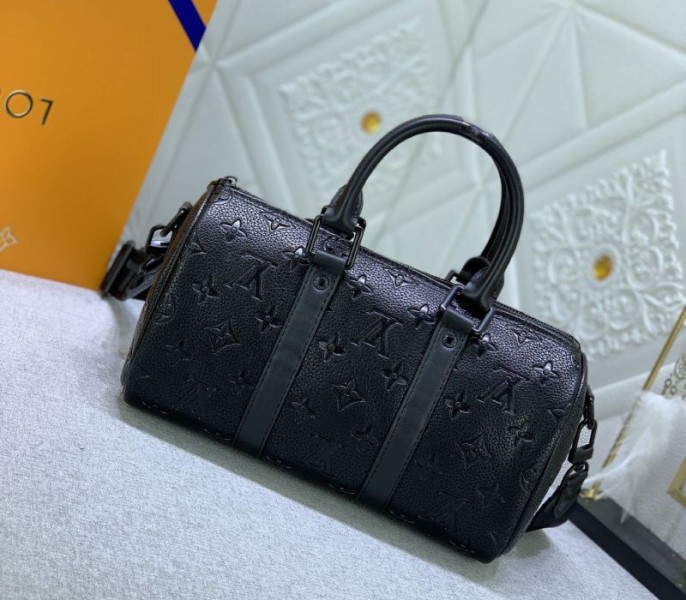 Louis Vuitton Taurillon Monogram Leather Keepall Bandouliere 25 In Black