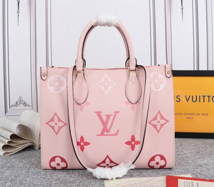 Louis Vuitton Monogram Empreinte Leather Onthego MM Bag In Pink