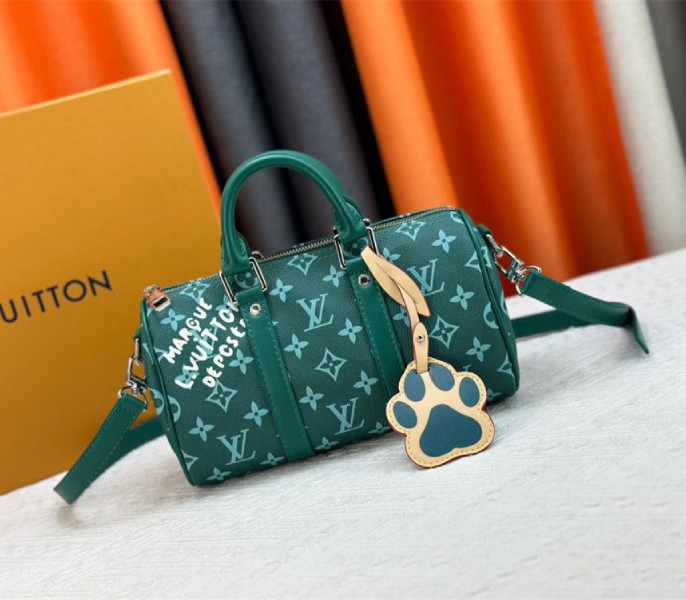 Louis Vuitton Monogram Heritage Canvas Keepall Bandouliere 25 In Green
