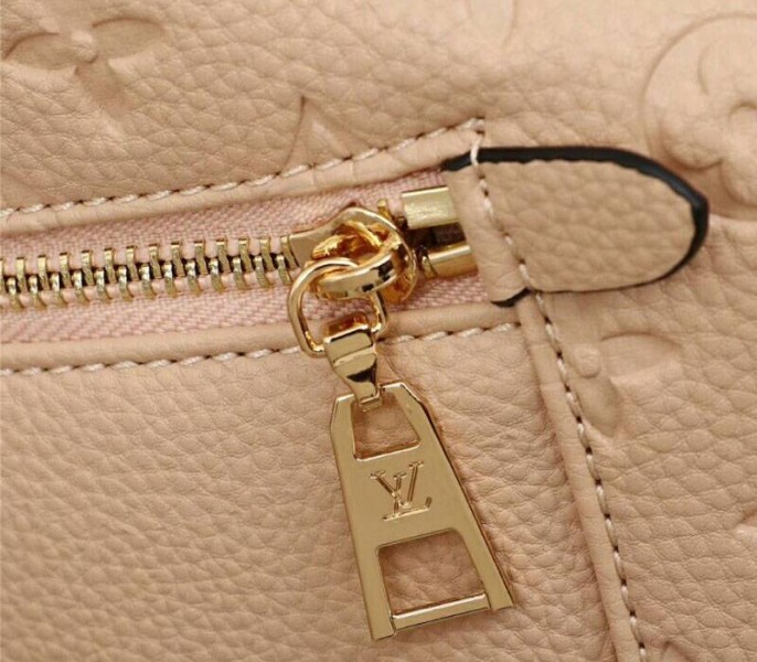Louis Vuitton Monogram Empreinte Melie Hobo In Beige