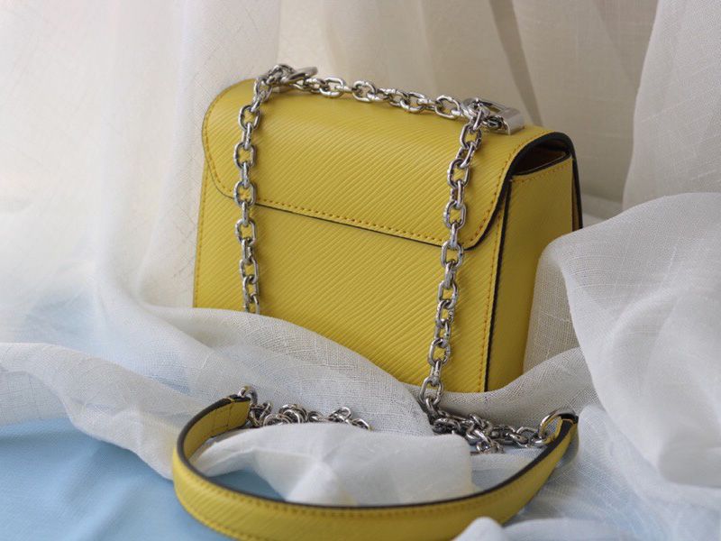 Louis Vuitton Epi Leather Twist Mini Bag In Yellow