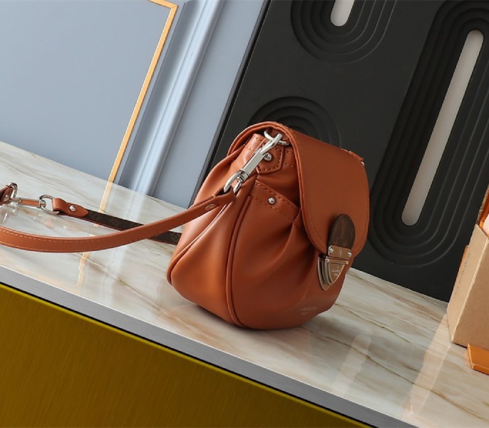 Louis Vuitton Sunset Vibe Bag In Cognac Brown
