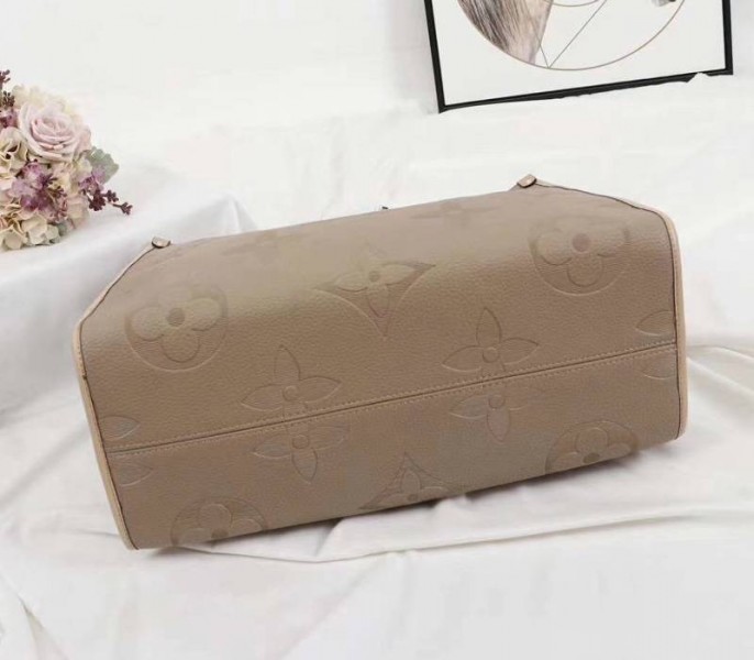 Louis Vuitton Monogram Empreinte Giant Onthego GM Tote In Beige