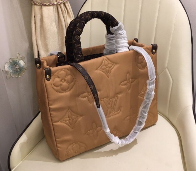 Louis Vuitton Econyl Regenerated Nylon Onthego GM Tote In Beige