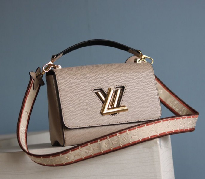 Louis Vuitton Epi Leather Twist MM Handbag In Galet Gray With Embroidered Strap