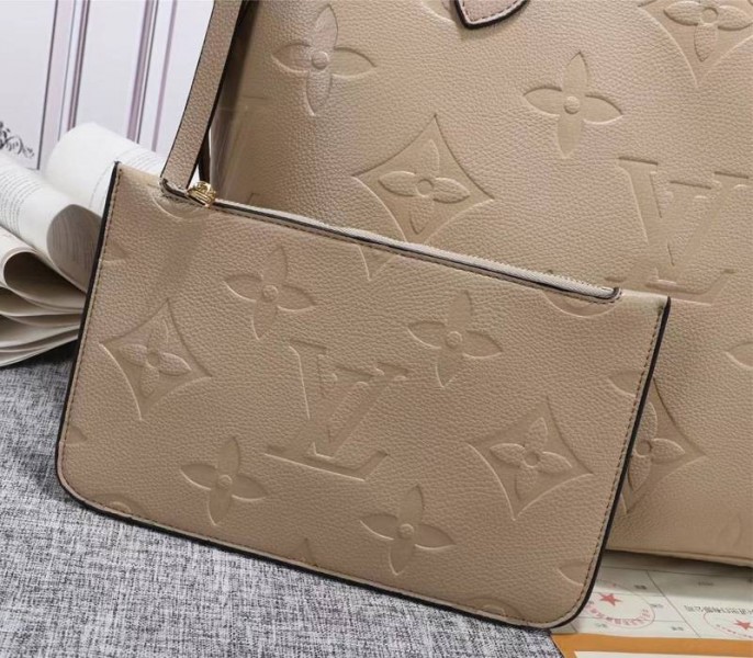 Louis Vuitton Monogram Empreinte Neverfull MM Tote In Beige