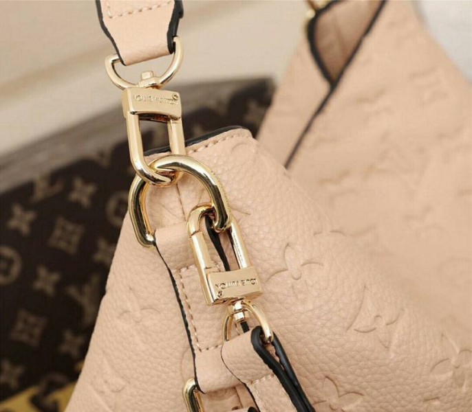 Louis Vuitton Monogram Empreinte Melie Hobo In Beige
