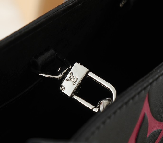 Monogram Empreinte OnTheGo MM Tote In Black And Magenta Pink