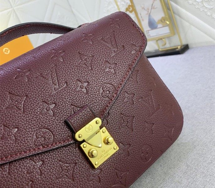 Monogram Empreinte Leather Metis In Wine