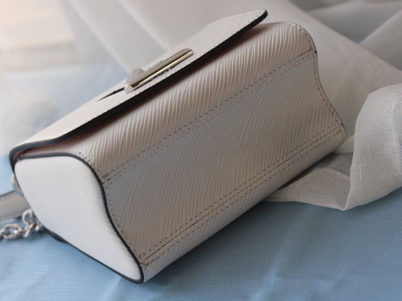 Louis Vuitton Epi Leather Twist Mini Bag In Off-White
