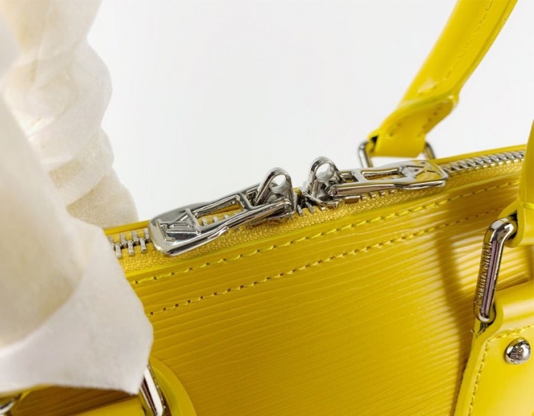Louis Vuitton Epi Leather Alma PM Handbag In Cedrat Yellow With Jacquard Strap