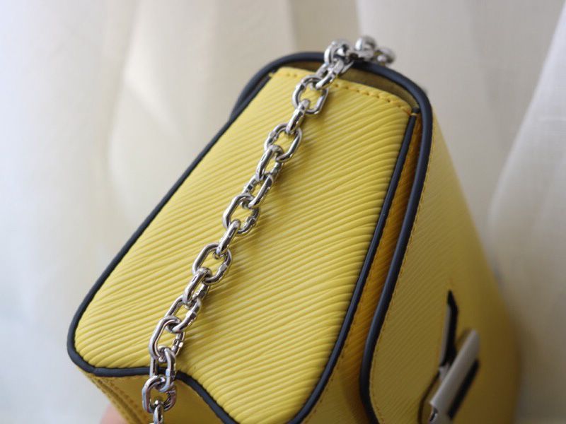 Louis Vuitton Epi Leather Twist Mini Bag In Yellow