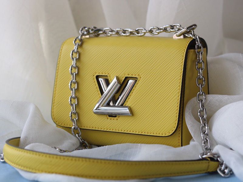 Louis Vuitton Epi Leather Twist Mini Bag In Yellow