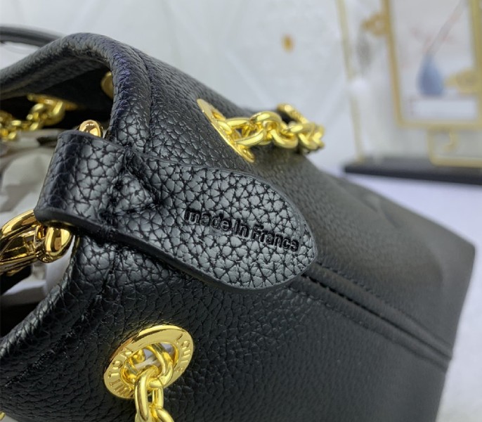 Louis Vuitton Monogram Empreinte Leather Bundle Bag In Black