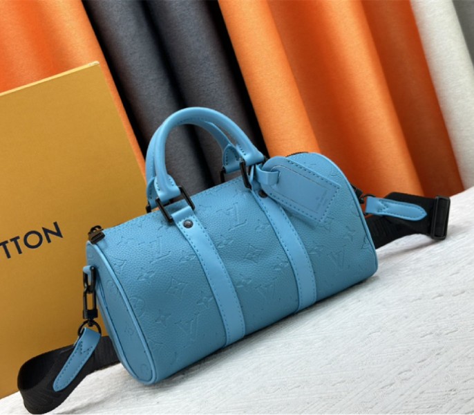 Louis Vuitton Taurillon Monogram Leather Keepall Bandouliere 25 In Turquoise