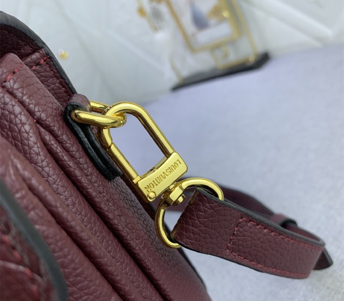 Monogram Empreinte Leather Metis In Wine