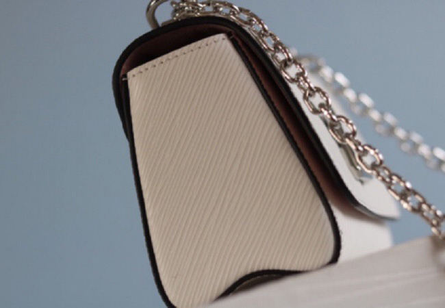 Louis Vuitton Epi Leather Twist Mini Bag In Off-White