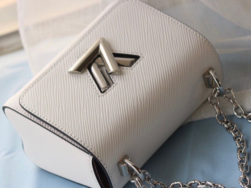 Louis Vuitton Epi Leather Twist Mini Bag In Off-White