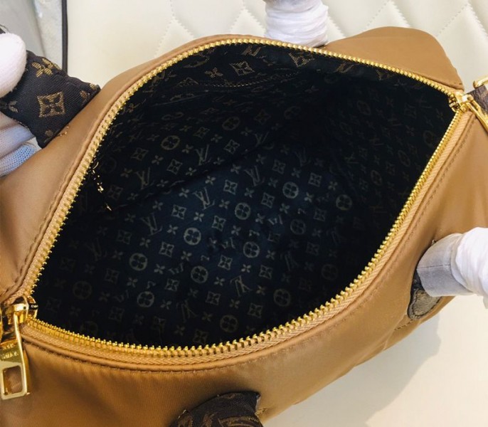 Louis Vuitton Econyl Regenerated Nylon Speedy Bandouliere 30 Handbag In Beige