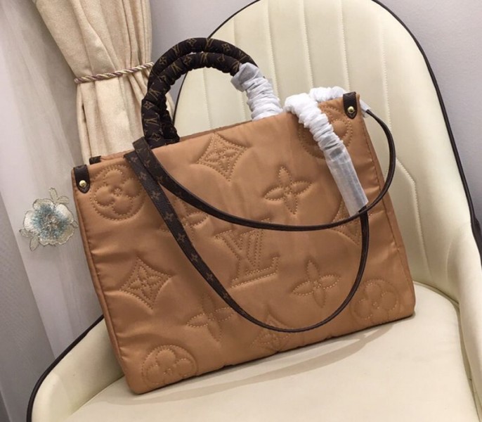 Louis Vuitton Econyl Regenerated Nylon Onthego GM Tote In Beige