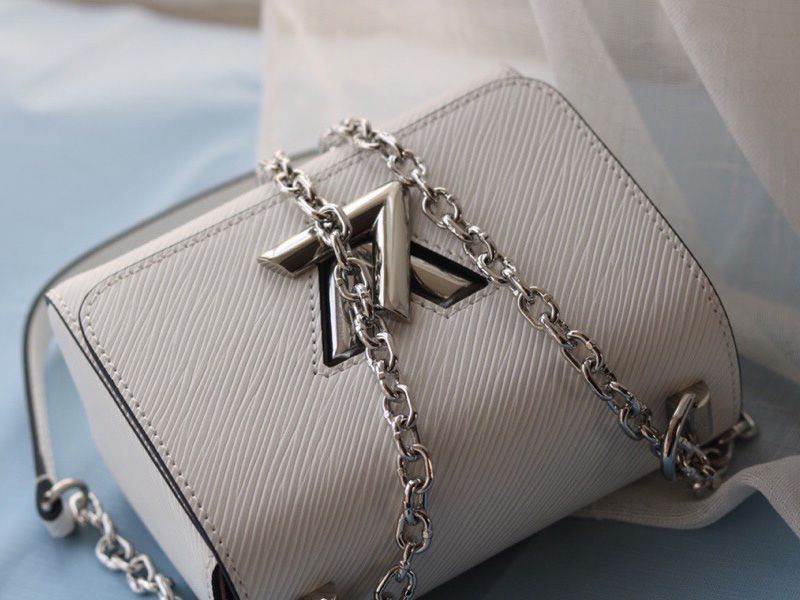 Louis Vuitton Epi Leather Twist Mini Bag In Off-White