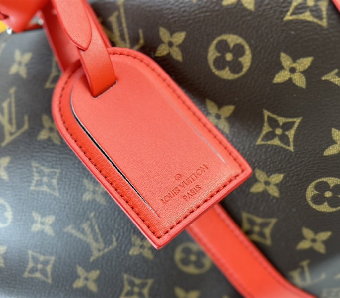 Louis Vuitton Monogram Macassar Canvas Keepall Bandouliere 50 In Red