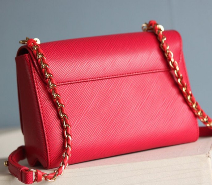 Louis Vuitton Epi Leather Twist MM Bag In Red