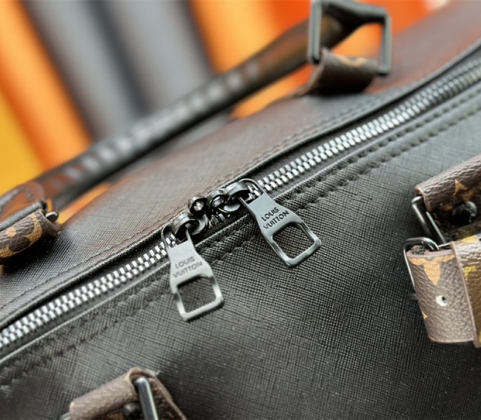 Louis Vuitton Taiga Leather Keepall Bandouliere 45 In Black And Monogram Macassar Canvas