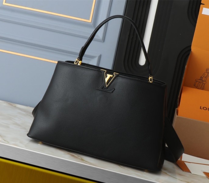Louis Vuitton Capucines GM Souple Handbag In Black