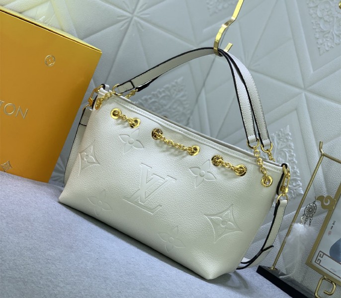 Louis Vuitton Monogram Empreinte Leather Bundle Bag In Cream